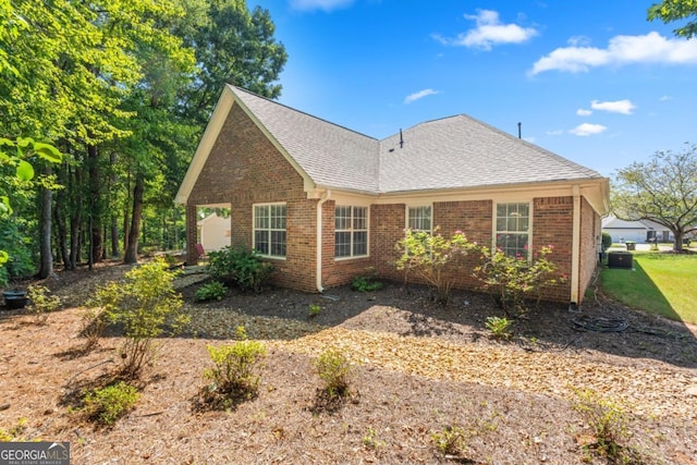 1152 Strath Clyde Way, Mcdonough, GA 30253 - view of home's exterior with brick siding and a shingled roof