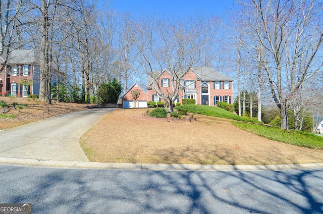 6450 Oak Valley Dr, Cumming, GA 30040 - colonial inspired home with concrete driveway