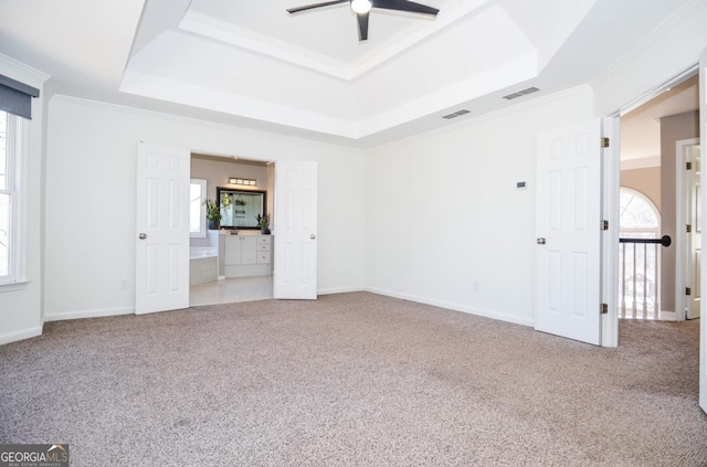 6450 Oak Valley Dr, Cumming, GA 30040 - unfurnished bedroom with a raised ceiling, carpet, crown molding, and ensuite bath