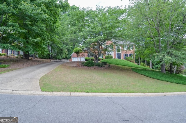 6450 Oak Valley Dr, Cumming, GA 30040 - view of front facade with a front yard and driveway