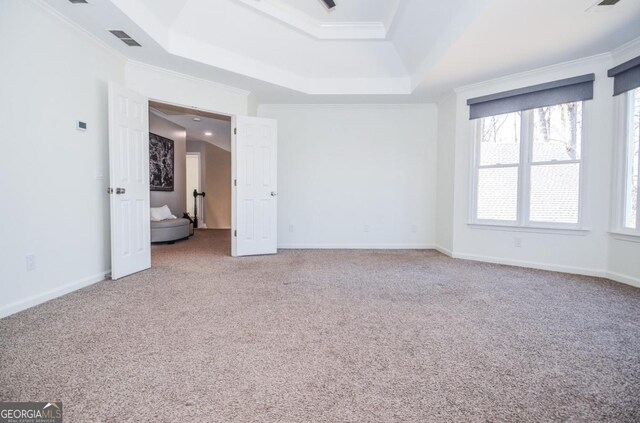 6450 Oak Valley Dr, Cumming, GA 30040 - unfurnished bedroom with carpet, ornamental molding, and a tray ceiling