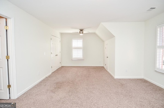 6450 Oak Valley Dr, Cumming, GA 30040 - additional living space featuring carpet, a ceiling fan, and healthy amount of natural light