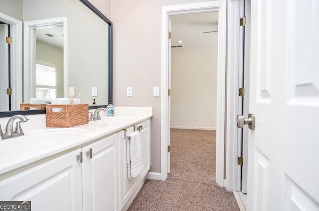 6450 Oak Valley Dr, Cumming, GA 30040 - full bath featuring double vanity and baseboards