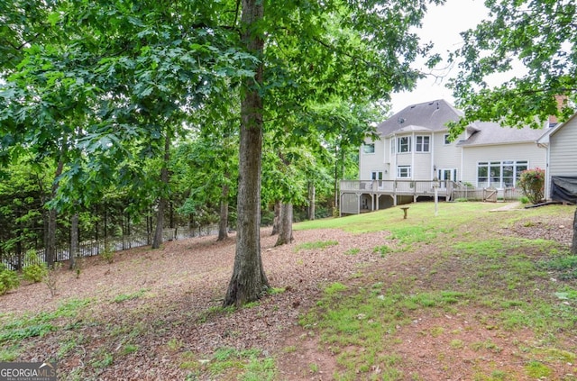 6450 Oak Valley Dr, Cumming, GA 30040 - view of yard featuring a deck