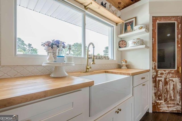 27 Graham Rd, Dallas, GA 30132 - kitchen with wood counters, a sink, and plenty of natural light