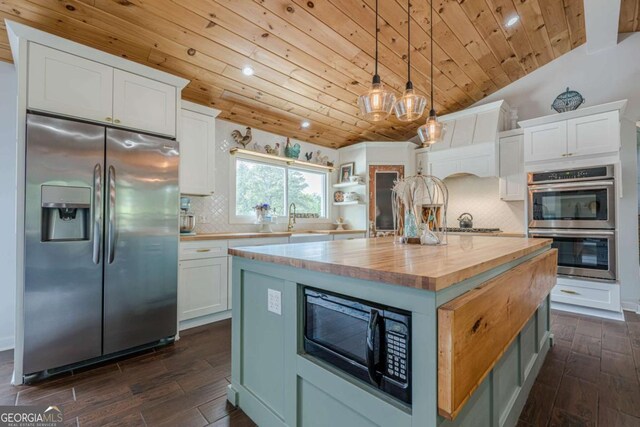 27 Graham Rd, Dallas, GA 30132 - kitchen featuring appliances with stainless steel finishes, wooden ceiling, butcher block counters, dark wood-style flooring, and white cabinets
