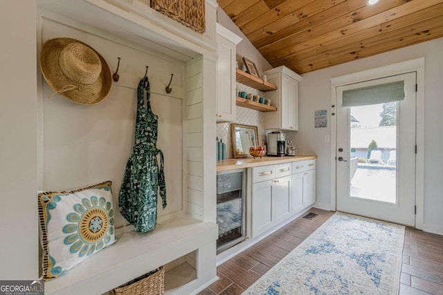 27 Graham Rd, Dallas, GA 30132 - mudroom with wooden ceiling, wine cooler, light wood-type flooring, and lofted ceiling