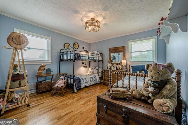 27 Graham Rd, Dallas, GA 30132 - bedroom featuring crown molding, wood finished floors, and a textured ceiling