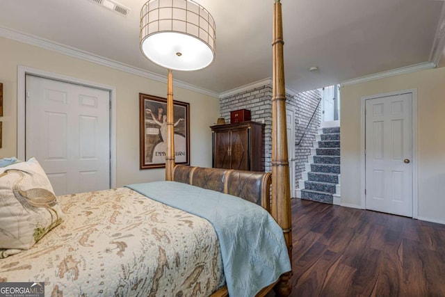 27 Graham Rd, Dallas, GA 30132 - bedroom featuring wood finished floors, ornamental molding, and baseboards