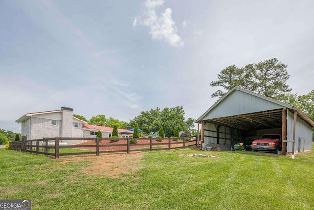 27 Graham Rd, Dallas, GA 30132 - view of yard featuring a detached carport and an outbuilding