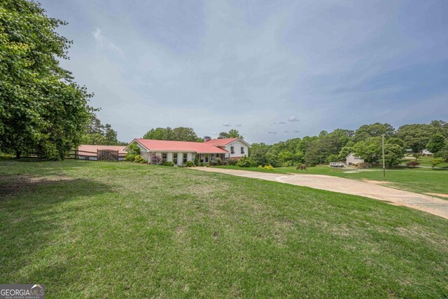27 Graham Rd, Dallas, GA 30132 - ranch-style house featuring driveway and a front yard