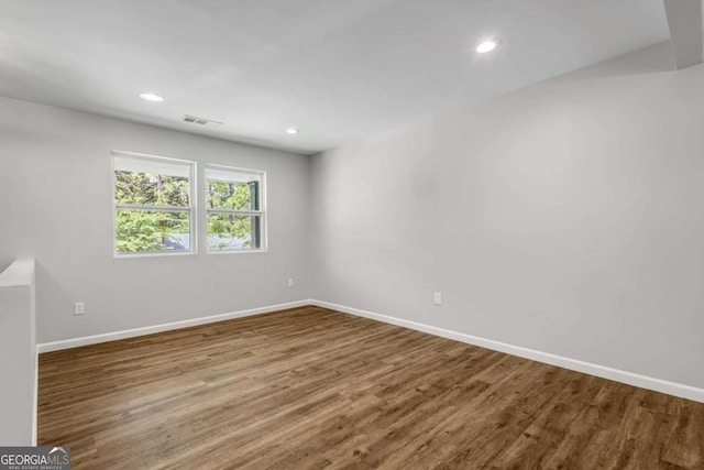 2184 Cherokee Valley Cir, Lithonia, GA 30058 - unfurnished room with wood finished floors and recessed lighting