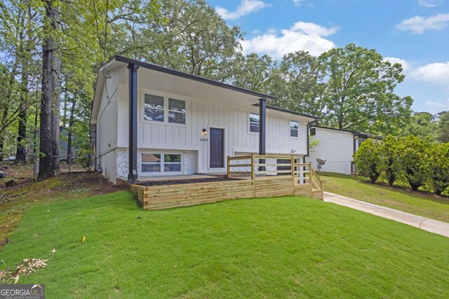 2184 Cherokee Valley Cir, Lithonia, GA 30058 - split foyer home with a front yard