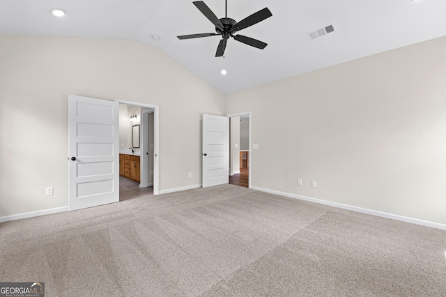 1356 Waymanville Rd, Thomaston, GA 30286 - unfurnished bedroom featuring carpet flooring, baseboards, ensuite bath, recessed lighting, and high vaulted ceiling