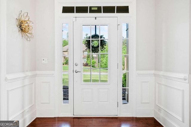 3230 Sundew Dr NW, Acworth, GA 30101 - entrance foyer with a decorative wall, wainscoting, and dark wood-type flooring