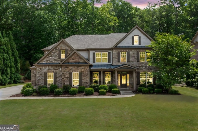 3230 Sundew Dr NW, Acworth, GA 30101 - view of front of property with a lawn, a standing seam roof, stone siding, and a shingled roof