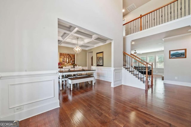 3230 Sundew Dr NW, Acworth, GA 30101 - entryway with stairway, hardwood / wood-style flooring, coffered ceiling, beamed ceiling, and a chandelier