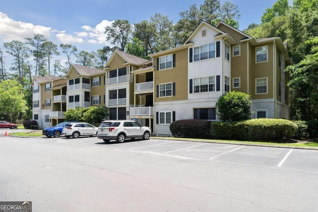 6306 Walden Park Dr, Savannah, GA 31410 - view of apartment building / complex with uncovered parking