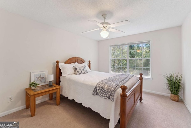 6306 Walden Park Dr, Savannah, GA 31410 - bedroom featuring carpet flooring, baseboards, a ceiling fan, and a textured ceiling