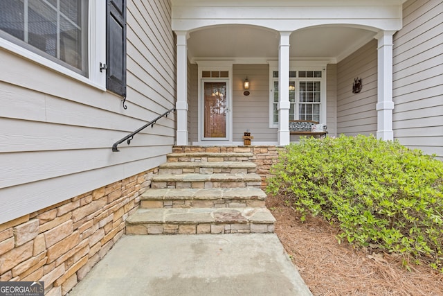 property entrance with a porch