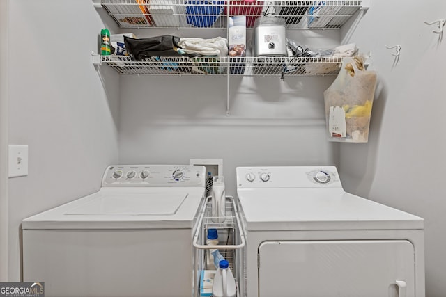 washroom featuring independent washer and dryer