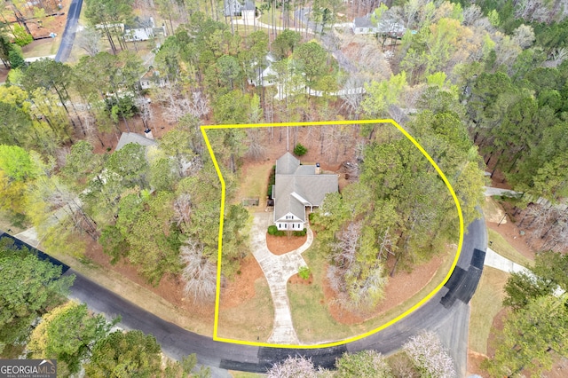 aerial view of property and surrounding area with property boundaries highlighted