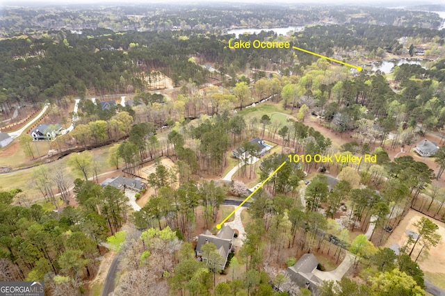 aerial view of property's location featuring a large body of water
