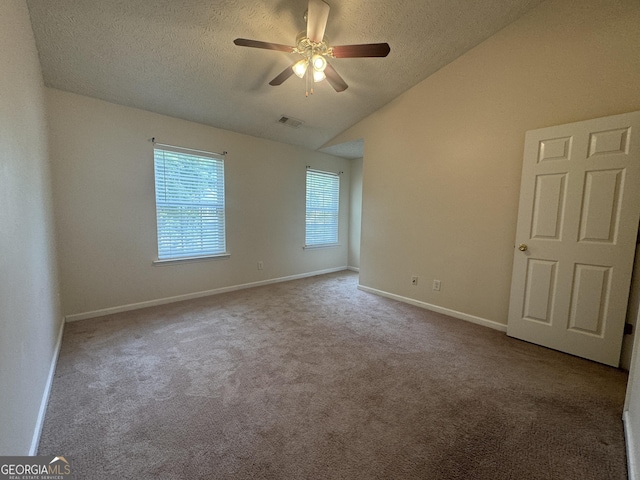 218 Osmanthus Way, Canton, GA 30114 - unfurnished room featuring ceiling fan, vaulted ceiling, carpet floors, and a textured ceiling