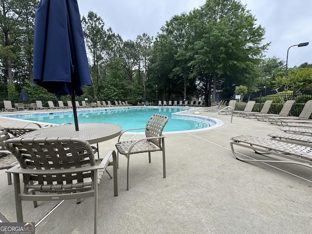 218 Osmanthus Way, Canton, GA 30114 - community pool featuring fence, a patio, and view of scattered trees