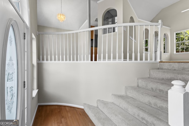 74 Rotunda Ct, Dallas, GA 30157 - entryway with lofted ceiling, wood finished floors, stairway, and baseboards