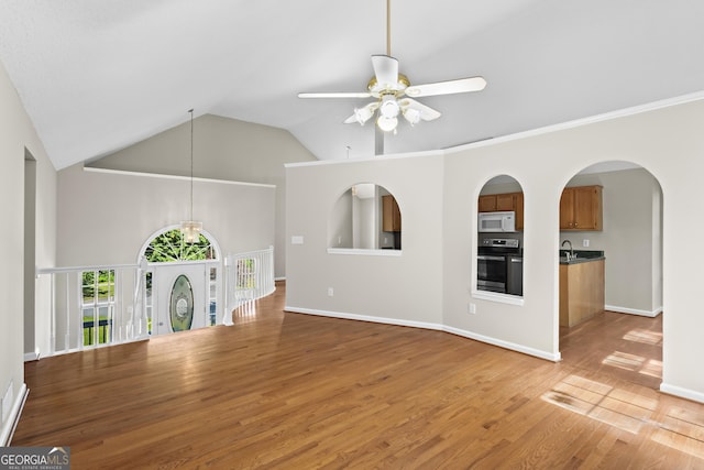 74 Rotunda Ct, Dallas, GA 30157 - unfurnished living room featuring ceiling fan, light wood-style floors, a sink, high vaulted ceiling, and baseboards