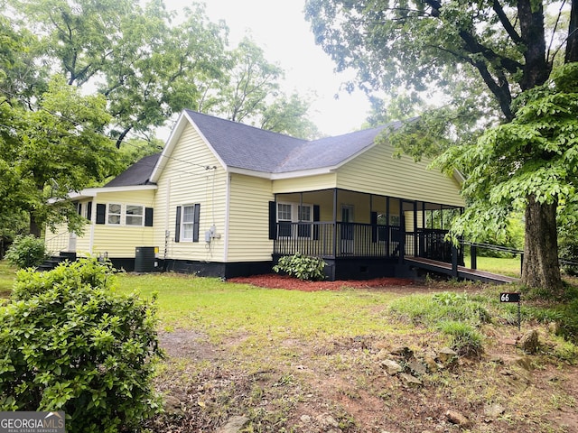 66 Kristys Path Dr, Eastanollee, GA 30538 - view of home's exterior with crawl space, central AC, roof with shingles, a porch, and a yard