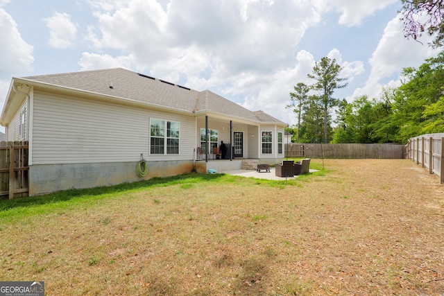 4043 Gramercy Dr, Valdosta, GA 31605 - rear view of house with a patio area and a shingled roof
