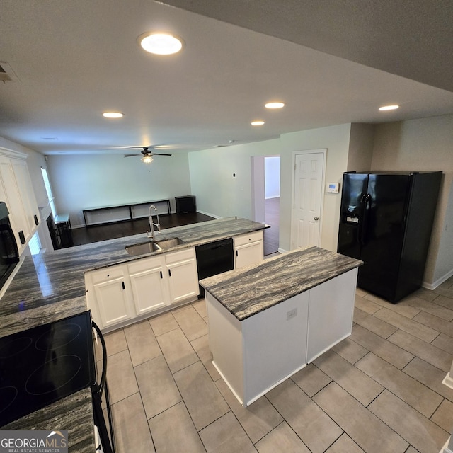 590 Dot Dr, Atlanta, GA 30349 - kitchen featuring black appliances, a sink, a ceiling fan, white cabinets, and recessed lighting