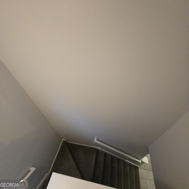 590 Dot Dr, Atlanta, GA 30349 - staircase with tile patterned flooring