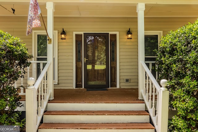 property entrance with a porch