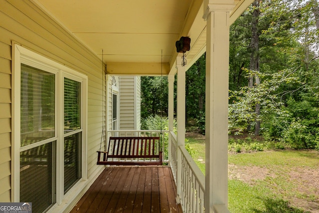wooden deck featuring a porch