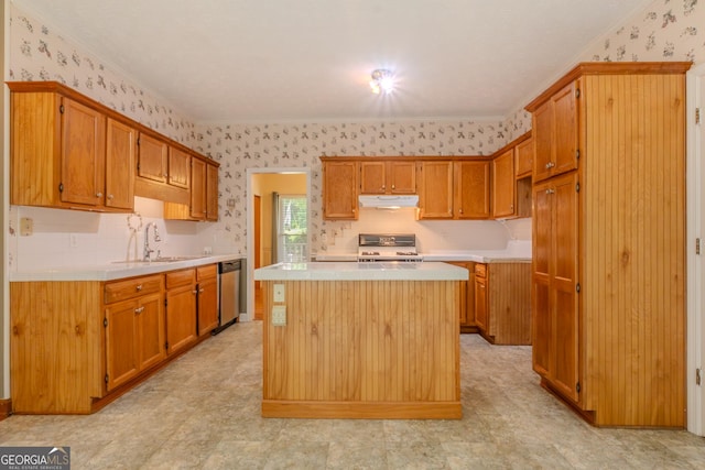 kitchen with dishwasher, wallpapered walls, a sink, under cabinet range hood, and a center island
