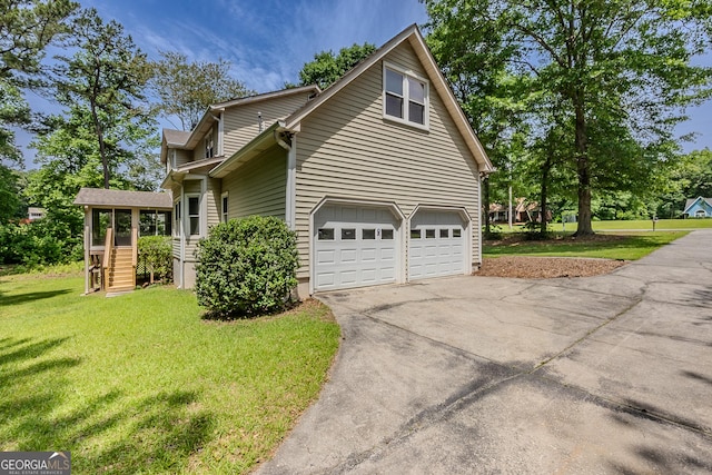 view of home's exterior featuring a yard, concrete driveway, and an attached garage