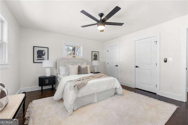 380 Atwood Dr NW, Marietta, GA 30064 - bedroom featuring dark wood-style flooring, baseboards, and a ceiling fan