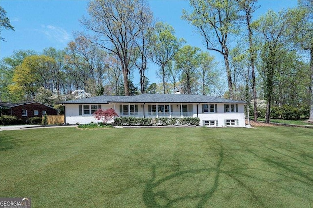 380 Atwood Dr NW, Marietta, GA 30064 - ranch-style home with a front lawn and covered porch