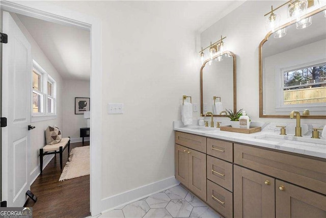 380 Atwood Dr NW, Marietta, GA 30064 - bathroom featuring double vanity and baseboards