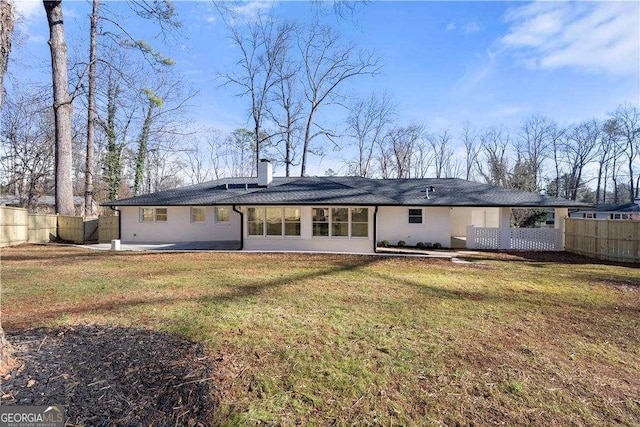 380 Atwood Dr NW, Marietta, GA 30064 - back of house with a chimney, a patio, and stucco siding