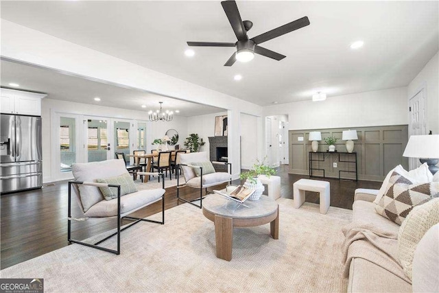 380 Atwood Dr NW, Marietta, GA 30064 - living area featuring ceiling fan, wood finished floors, recessed lighting, a chandelier, and a fireplace