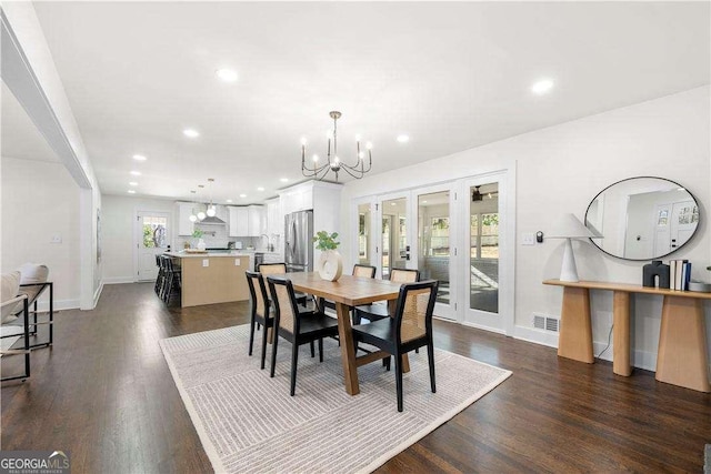 380 Atwood Dr NW, Marietta, GA 30064 - dining area featuring a chandelier, baseboards, french doors, recessed lighting, and dark wood-style flooring