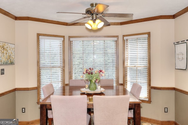 1935 Shrader Ct, Lawrenceville, GA 30044 - dining area featuring ceiling fan, ornamental molding, and baseboards