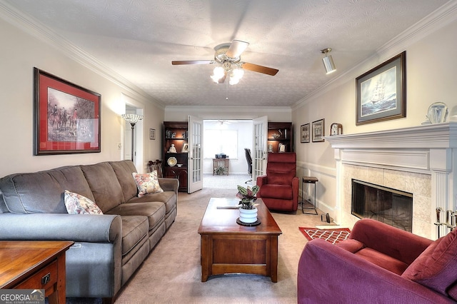 1935 Shrader Ct, Lawrenceville, GA 30044 - living area featuring ceiling fan, carpet, a premium fireplace, and crown molding
