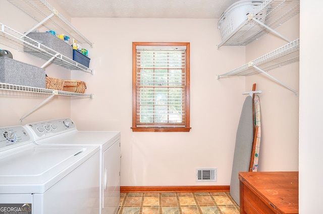 1935 Shrader Ct, Lawrenceville, GA 30044 - laundry room with independent washer and dryer and baseboards