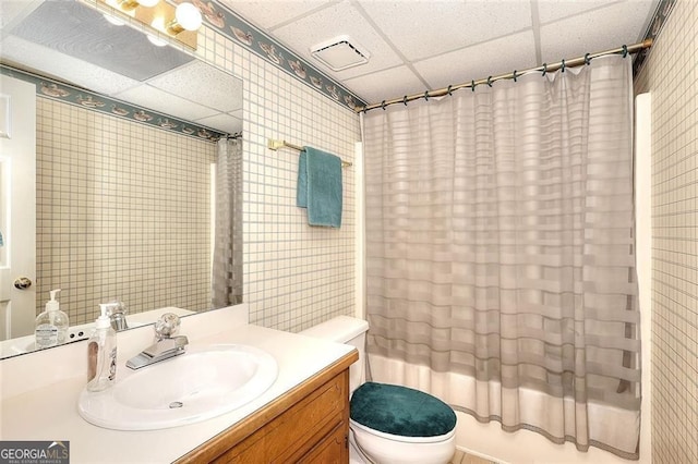 1935 Shrader Ct, Lawrenceville, GA 30044 - full bath with a drop ceiling, vanity, and shower / bath combo with shower curtain