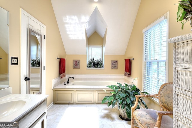 1935 Shrader Ct, Lawrenceville, GA 30044 - bathroom featuring lofted ceiling, a bath, and vanity